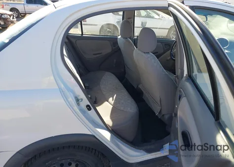 2001 Toyota Echo z USA, uszkodzony, nr VIN JTDBT123410144164